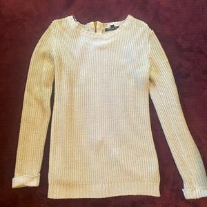 Light blue sweater with zipper along the spine